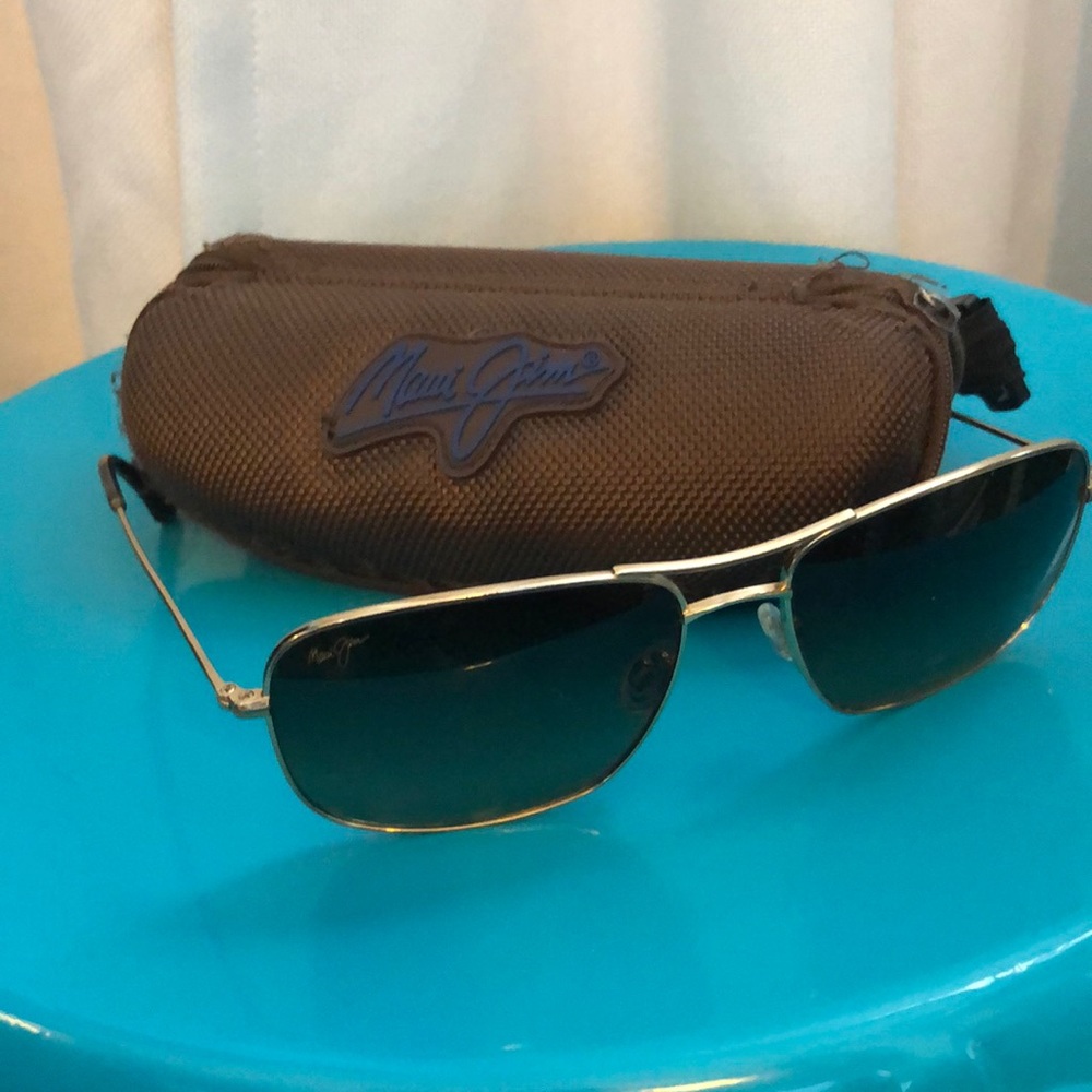 Maui Jim sunglasses and case.